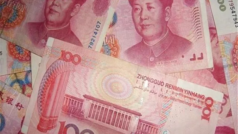 تضرر الين الياباني من انتعاش الدولار بسبب التيسير النقدي