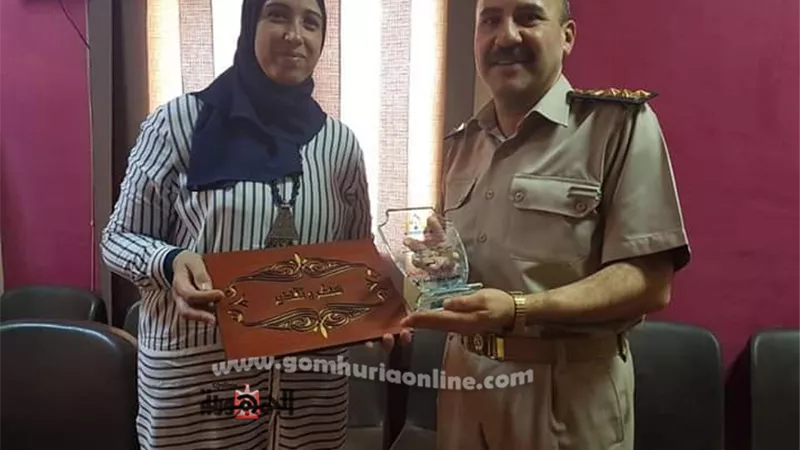 درع قومى المرأة ببنى سويف لرئيس الأحوال المدنية