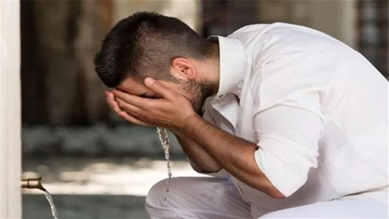 ما هو القدر المجزىء لمسح الرأس أثناء الوضوء؟