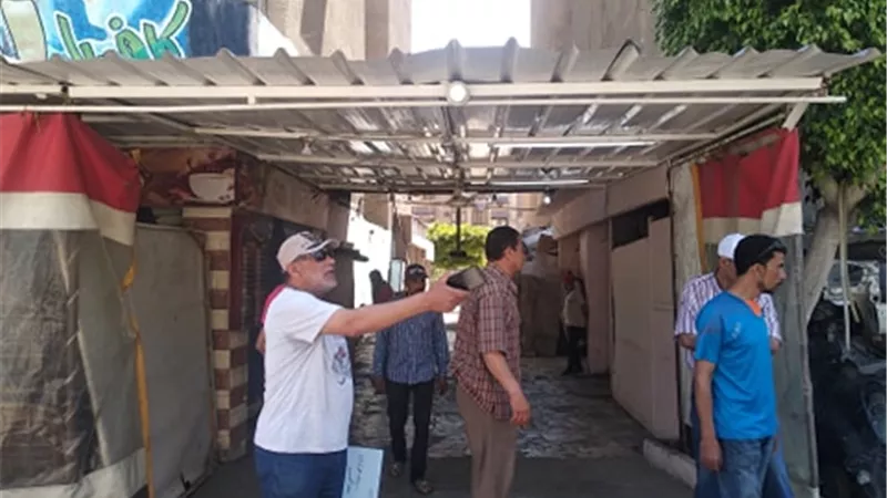 تنفيذ قرارإدارى بإزالة سقيفة مخالفة بعرض الشارع لأحد الكافيهات بضواحى بورسعيد