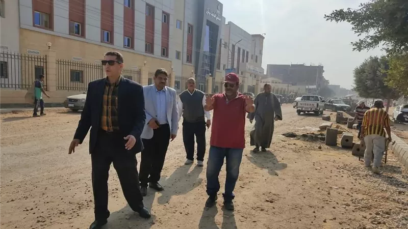 رفع كفاءة الشوارع والطرق بأهناسيا وتسليم فيز تكافل وكرامة للمستحقين
