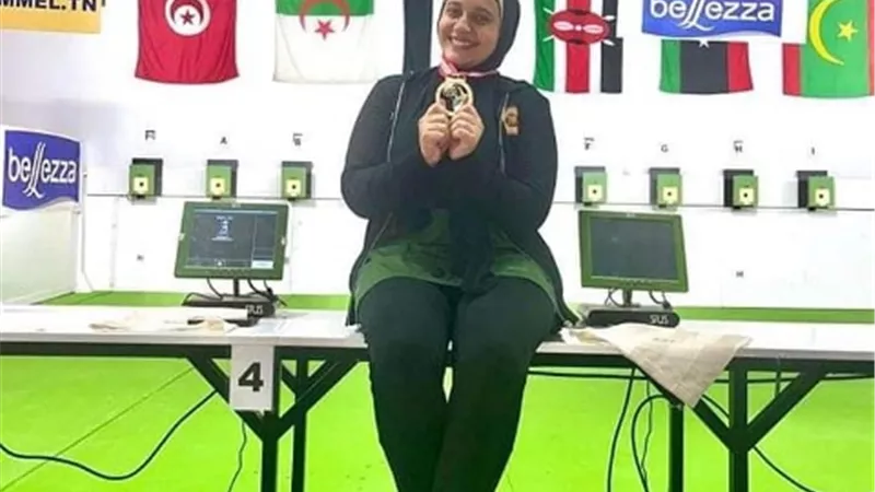 هالة لاعبة القناة الأول ببطولة افريقيا للمسدس ويارا الثالث
