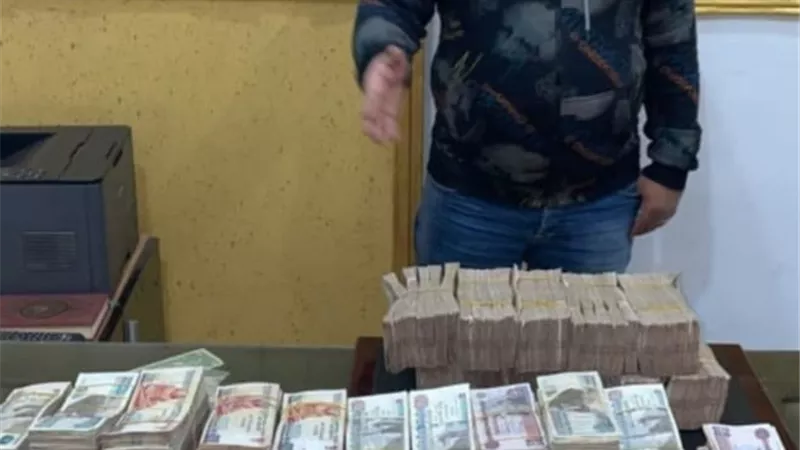 سقوط تاجر عملة بالجيزة