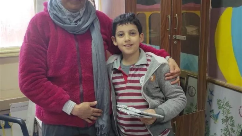تكريم طالب لموهبته القصصية بمدرسة الفاروق التجريبية بأسيوط