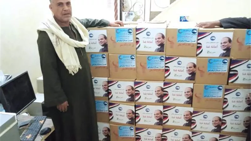 مستقبل وطن بقنا توزيع 1500 كرتونة مواد غذائية