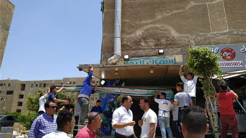 جهازالقاهرة الجديدة ينفذ عدة حملات لإزالة المخالفات بالتجمع الخامس.. صور