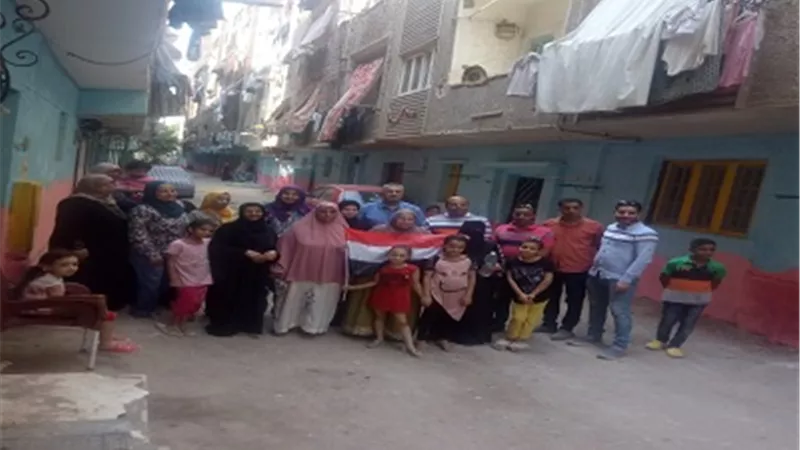 دهان 50 منزلاً بشارع صابر بالعمرانيه ضمن مبادرة 