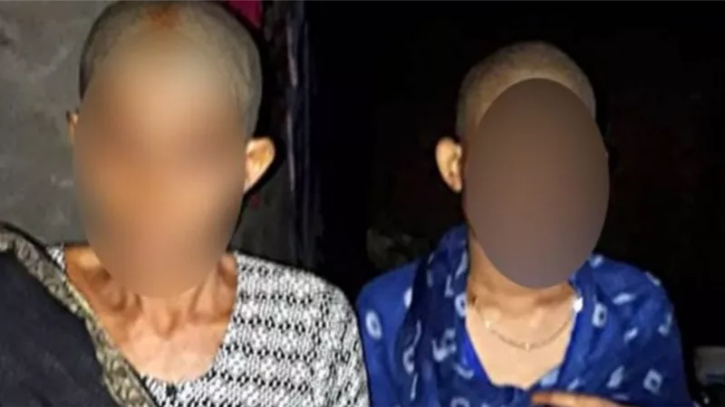 مسئول يحلق رأس سيدتين قاومتا الاغتصاب عقابا لهما