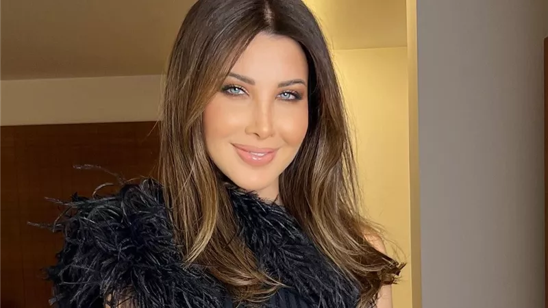 نانسي عجرم تخطف الانظار بفستان جرئ