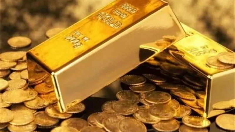 الذهب يتألق مع تراجع الدولار قبيل قرار الفائدة الأمريكية