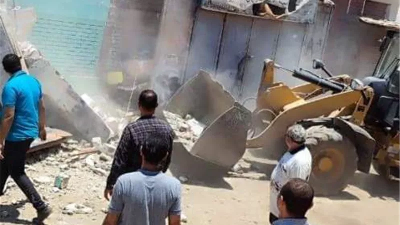٢٢ محضر إشغال فى حملة مكبرة بحي غرب مدينة المنيا
