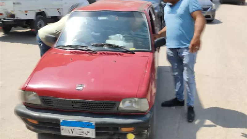 ضبط ٢١ سيارة مخالفة بهضبة الاهرام ..صور