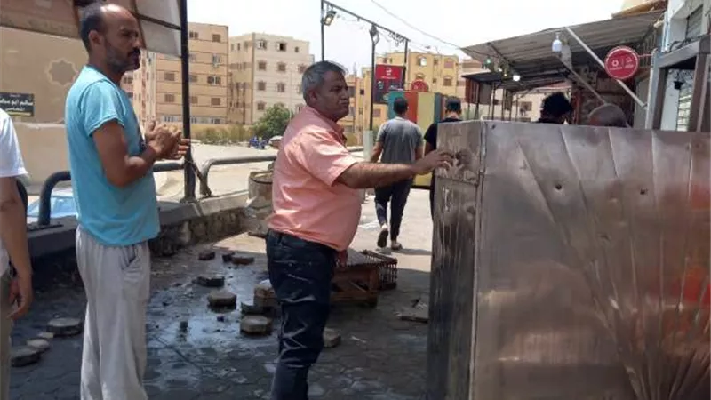 جهاز مدينة بدر يشن حملة على الإشغالات والإعلانات المخالفة.. صور