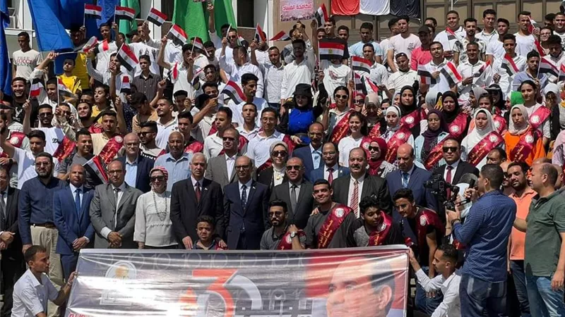 جامعة أسيوط تطلق مسيرة احتفالا بذكرى ثورة 30 يونيو
