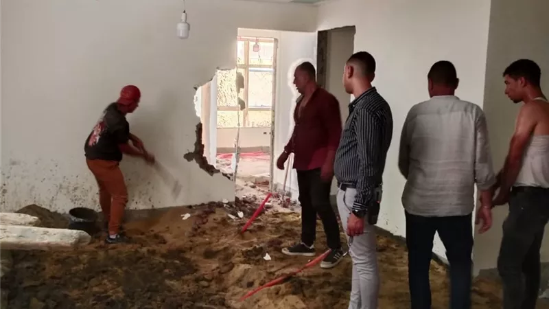 ضبط وازالة اعمال بناء وتعديلات مخالفة بعقار في العجوزة