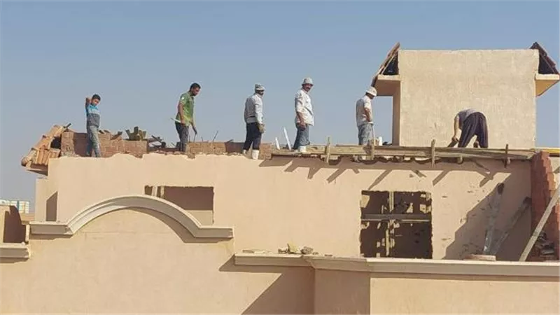 جهاز ٦ أكتوبر يشن حملة شرسة على مخالفات البناء وسيارات النقل /صور