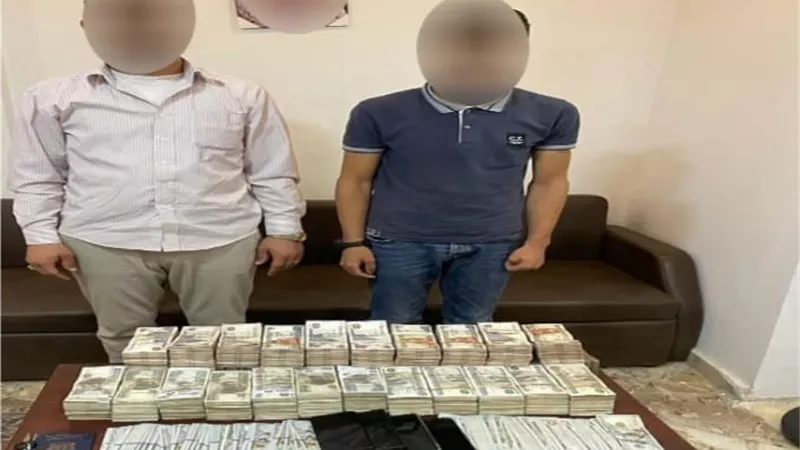 ضبط أجنبيين يتاجران فى العملة بالقاهرة