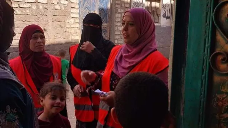 قومي المرأة بالمنيا ينفذ حملة طرق الأبواب بعنوان بلدي أمانة