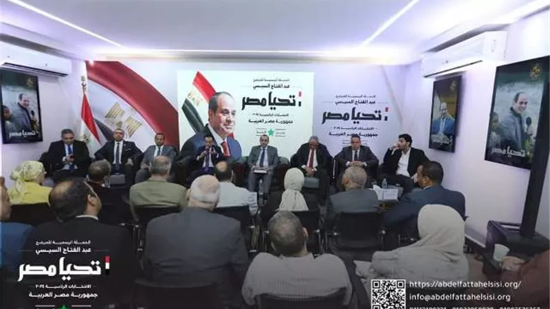 وفدًا من المالية والضرائب في زيارة لحملة الرئيس السيسي