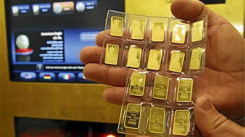 تفاصيل إطلاق أول ماكينة ATM لبيع سبائك الذهب.. فيديو
