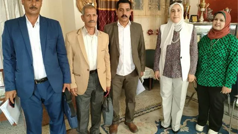 تعاون بين 