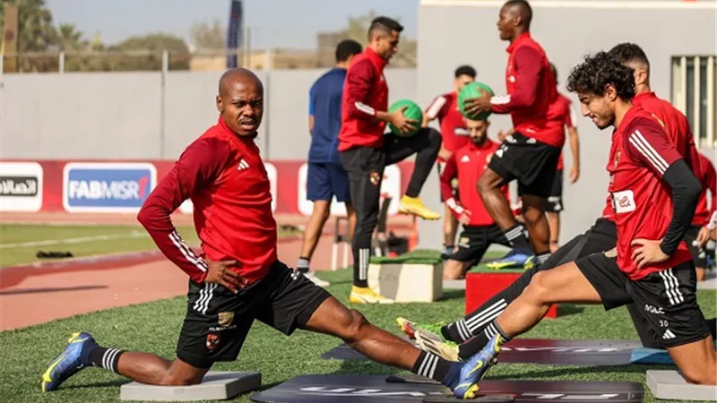 طاهر محمد وتاو يشاركان فى التدريبات الصباحية للأهلي
