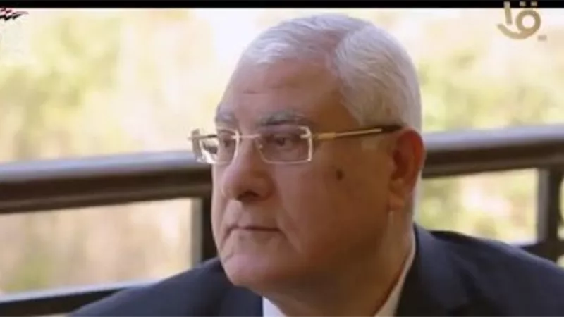 المستشار عدلى منصور يدلى بصوته فى الانتخابات الرئاسية بمقر لجنته بأكتوبر