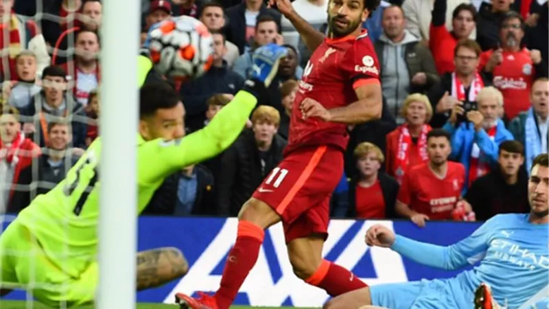 بعد تسجيله الهدف رقم 200 ..ليفربول يحتفل بمحمد صلاح