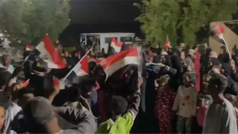 أعلام مصر تزين احتفالات الناخبين في قرية أبو سمبل النوبية بأسوان